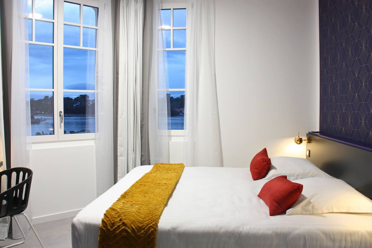 double room, lake view | desk, free wifi, bed sheets, wheelchair access