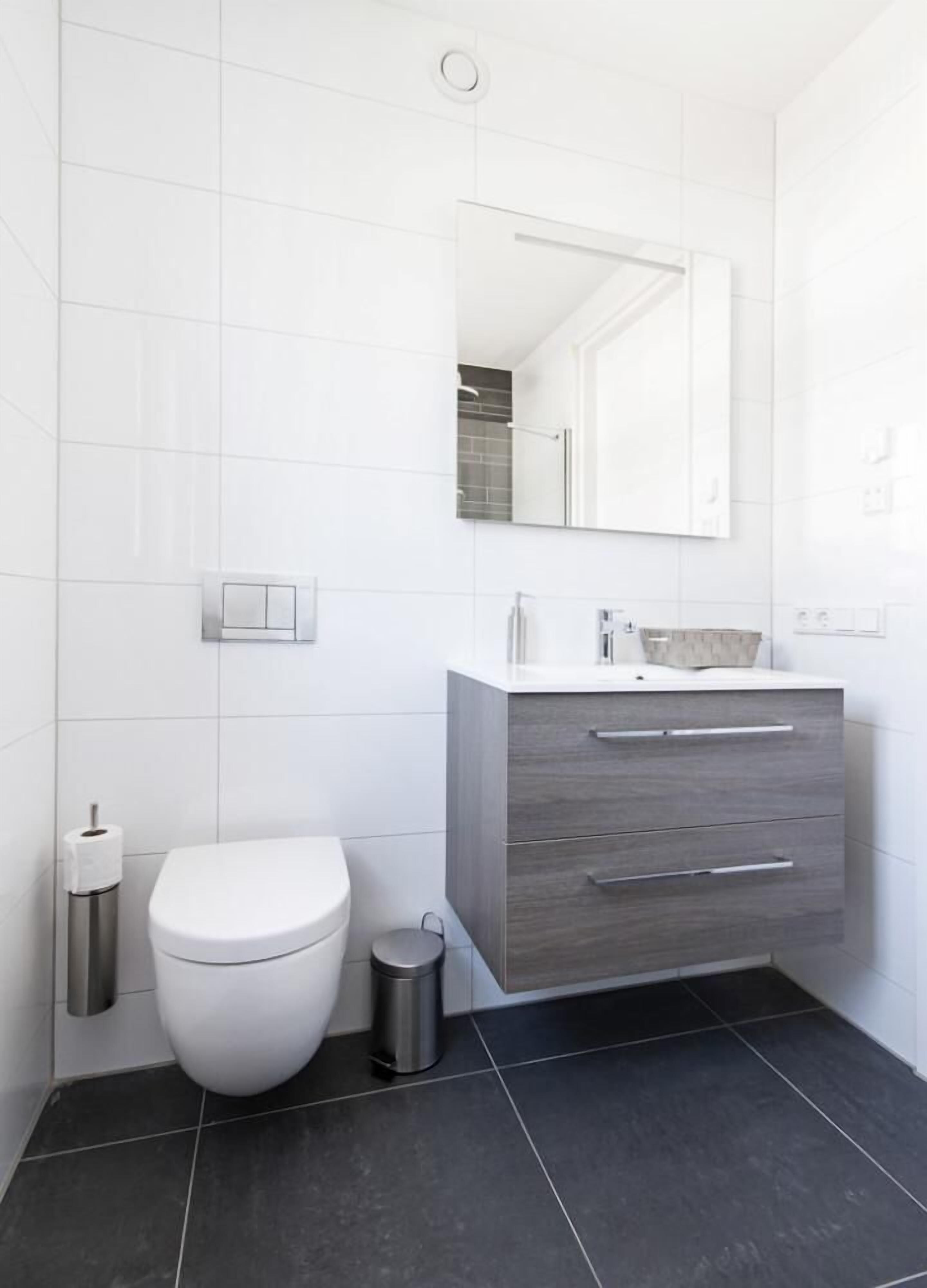 basic studio | bathroom | shower, rainfall showerhead, hair dryer, towels