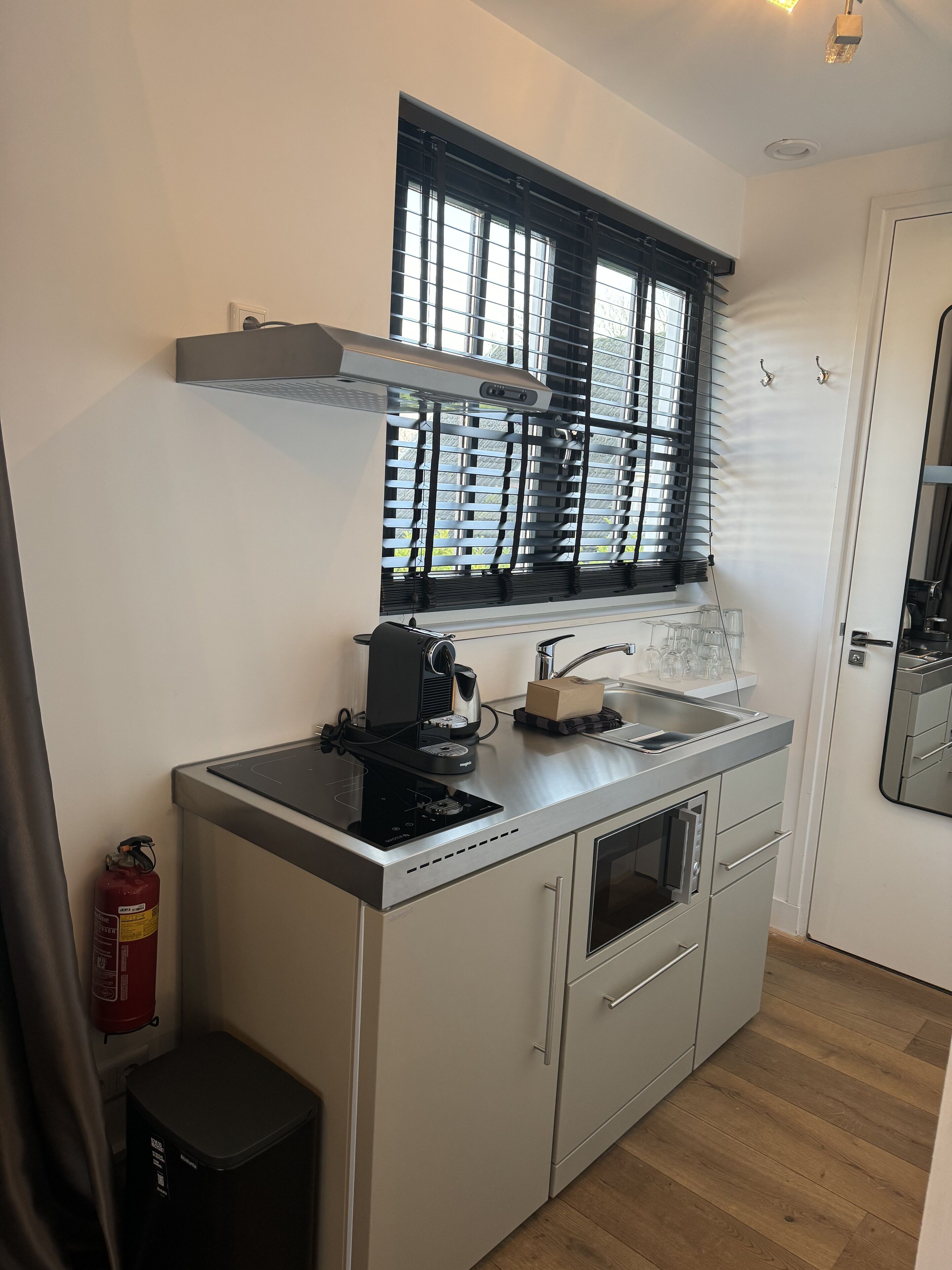 luxury studio, balcony, lake view | private kitchenette | full-sized fridge, microwave, espresso maker, coffee/tea maker