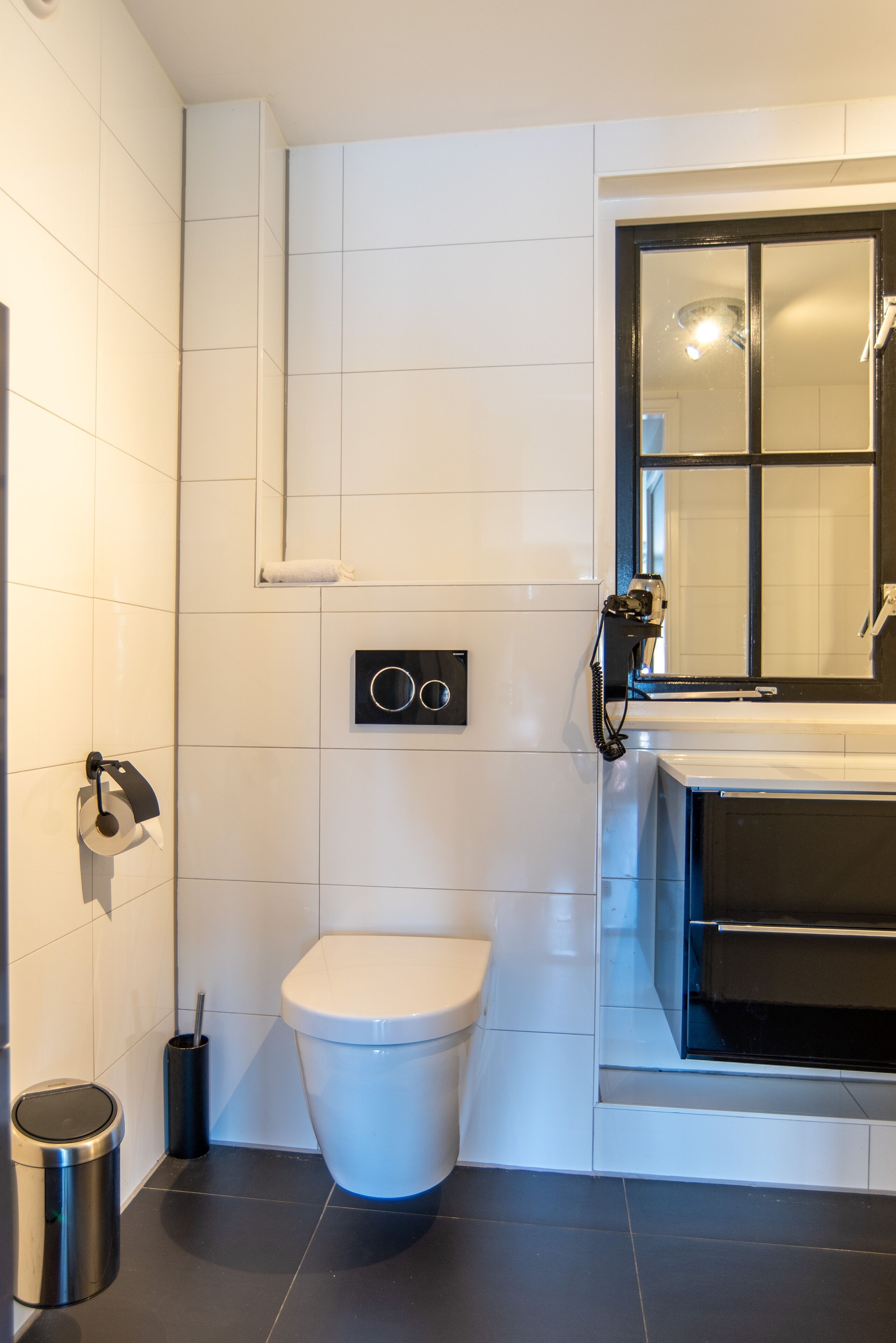 deluxe studio | bathroom | shower, rainfall showerhead, hair dryer, towels