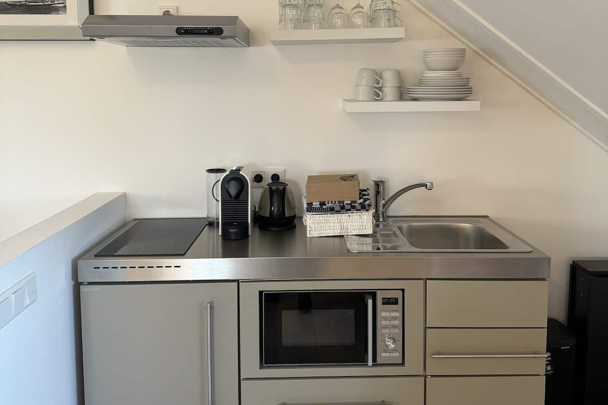 basic studio | private kitchenette | full-sized fridge, microwave, espresso maker, coffee/tea maker