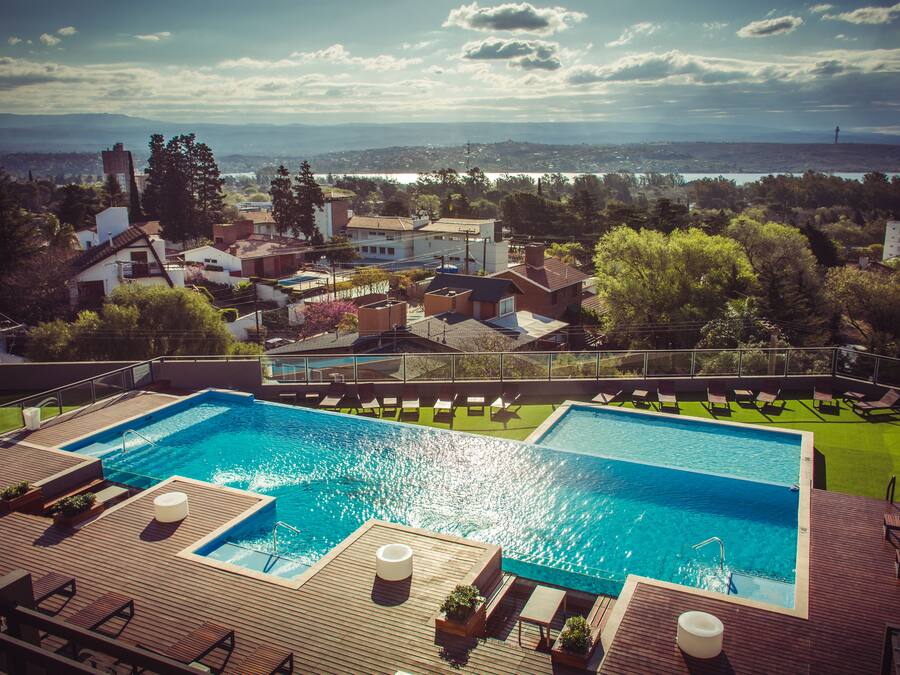 Indoor pool, outdoor pool, open 10 AM to 2:00 PM, pool umbrellas