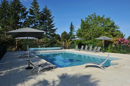 Seasonal outdoor pool, open 10:00 AM to 9:00 PM, sun loungers