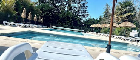 Seasonal outdoor pool, open 10:00 AM to 9:00 PM, sun loungers