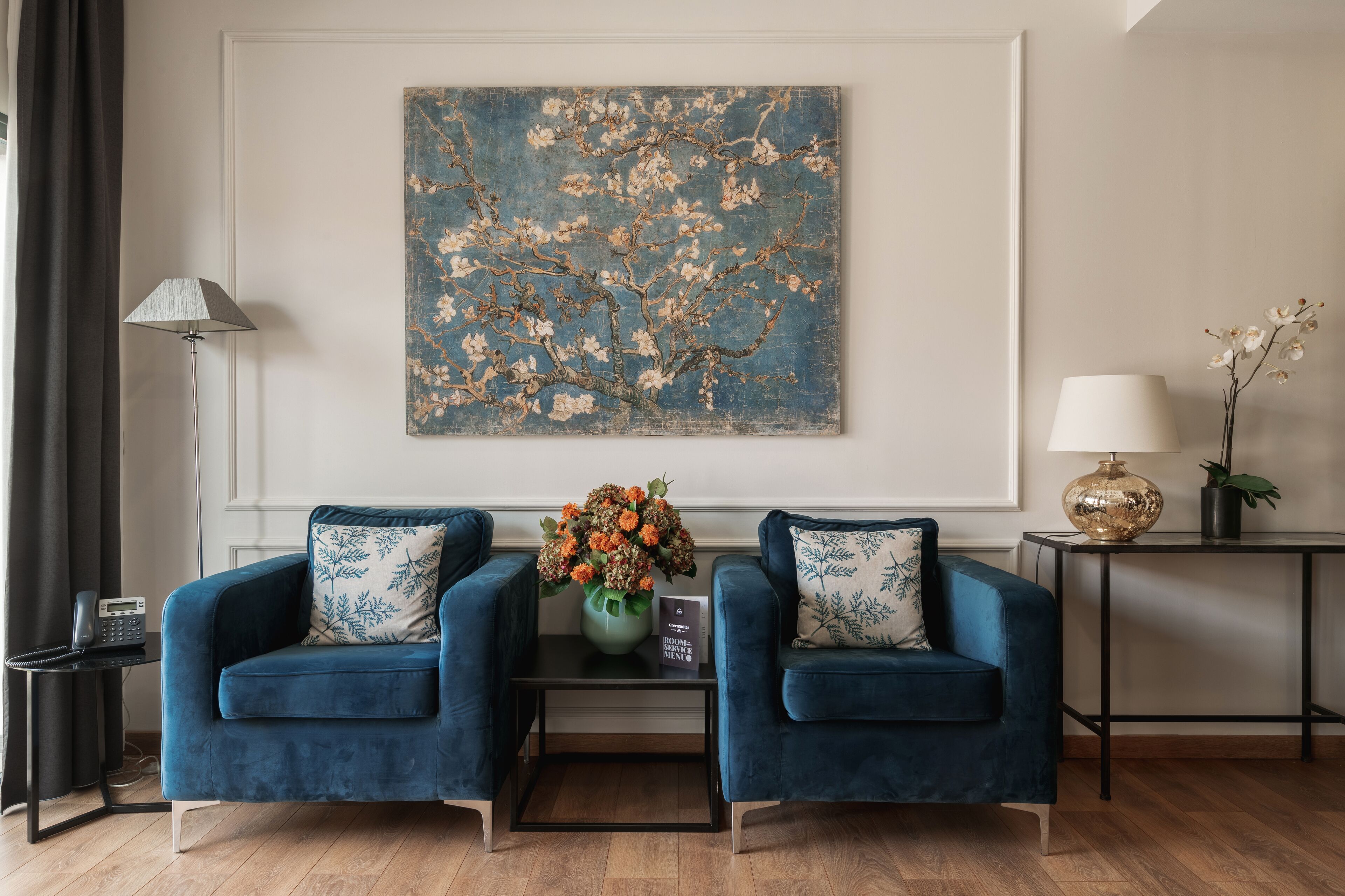 deluxe room | living room | 30-inch flat-screen tv with cable channels, tv