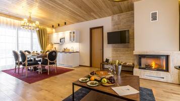 Luxury Suite (two bedroom) | Living area | Plasma TV