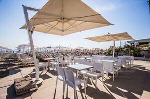 Private beach nearby, white sand, sun loungers, beach umbrellas