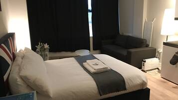 Superior Studio | Desk, iron/ironing board, cribs/infant beds, rollaway beds