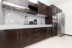 Condo | Private kitchen | Fridge, microwave, oven, dishwasher