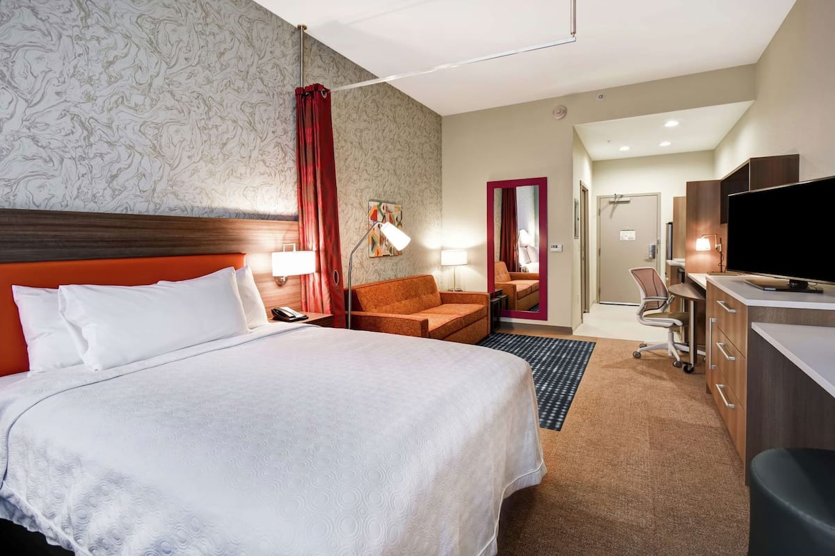 Hypo-allergenic bedding, pillow-top beds, desk, laptop workspace