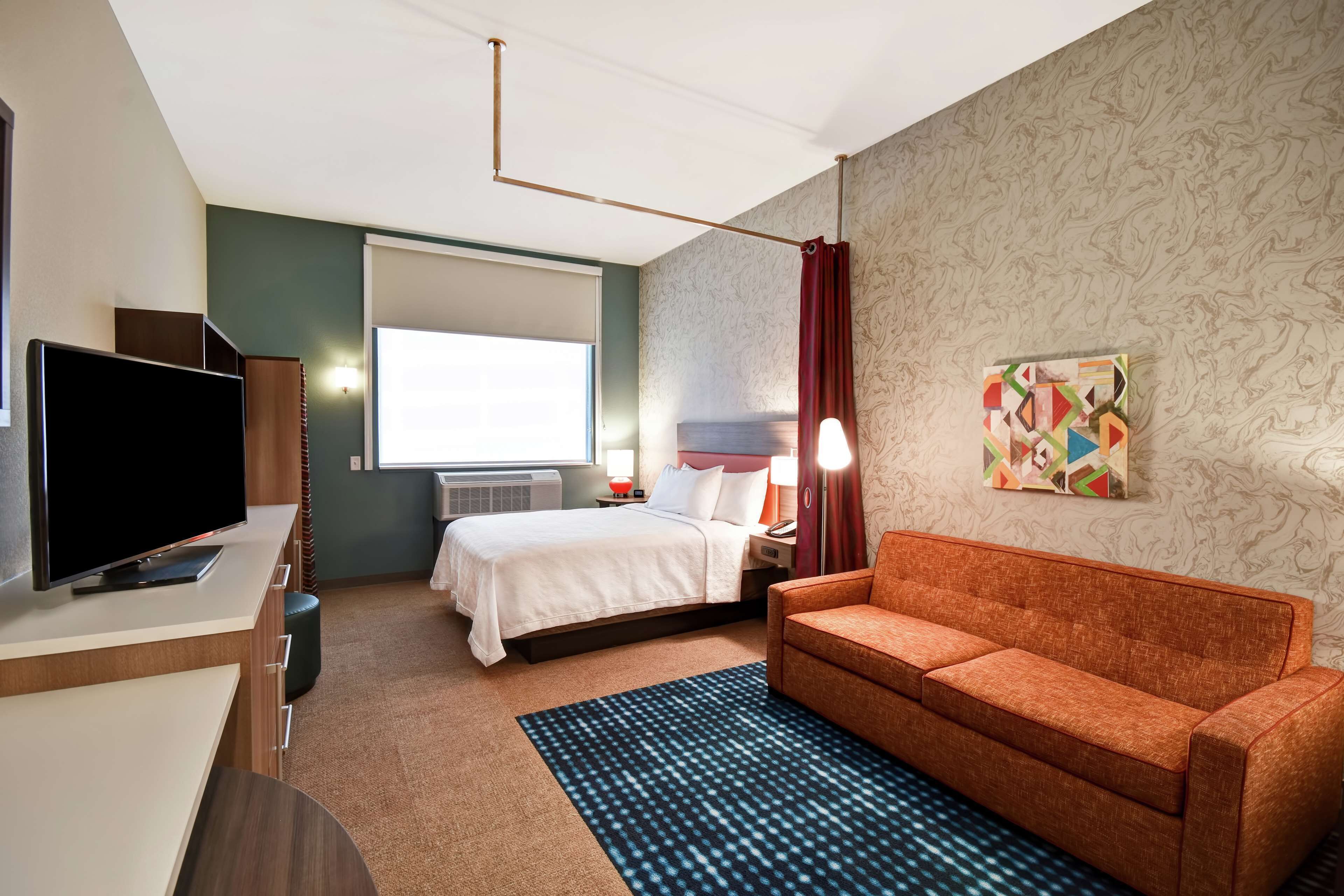 hypo-allergenic bedding, pillow-top beds, desk, laptop workspace