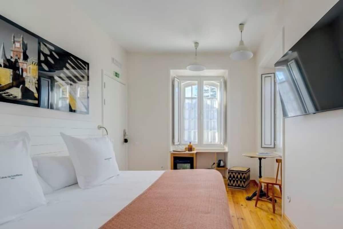 Articles gratuits dans le mini-bar, fer et planche à repasser