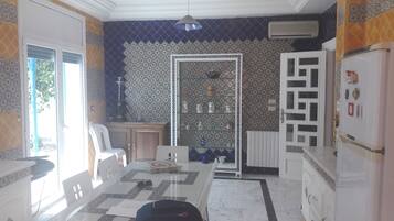 Villa | Private kitchen | Full-size fridge, microwave, oven, stovetop