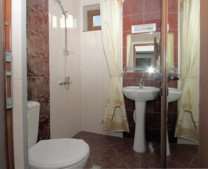 Shower, free toiletries, hair dryer, slippers