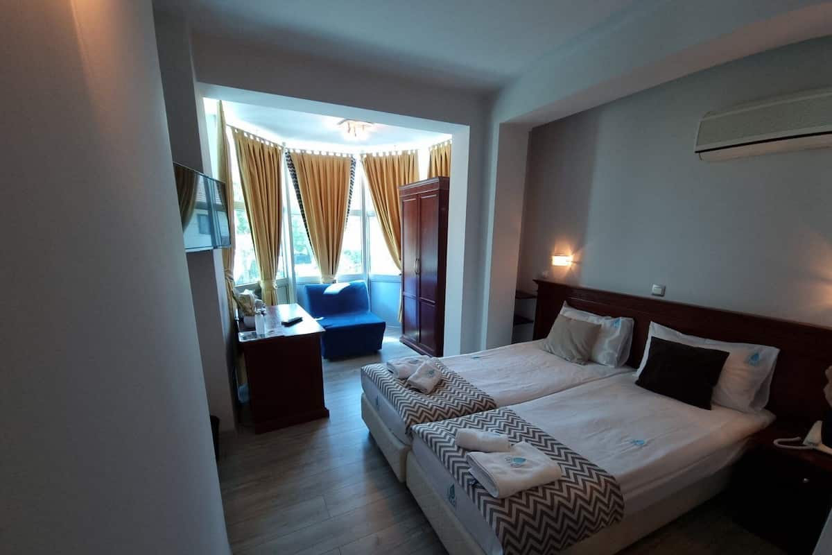 Ropa de cama de alta calidad y minibar
