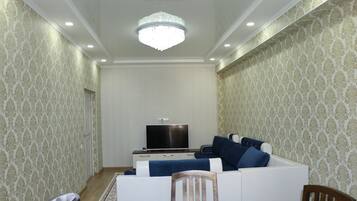 Standard Apartment, 2 Bedrooms, Kitchen | Living area | Flat-screen TV
