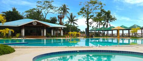 Outdoor pool, open 8 AM to 10 PM, pool umbrellas, pool loungers