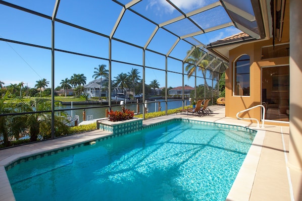 Outdoor pool, a heated pool - True 1st Class Luxury-Big SW Views, 6 Bikes,Walk to Beach, Weber Grill and more. (Marco Island)
