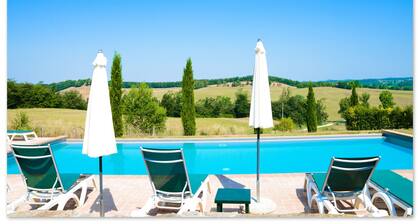 Tuscan village in SIena. farmhouse surrounded by garden,pool and panoramic view