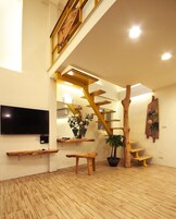 Superior Cabin, Multiple Beds, Mezzanine | Living area | Flat-screen TV