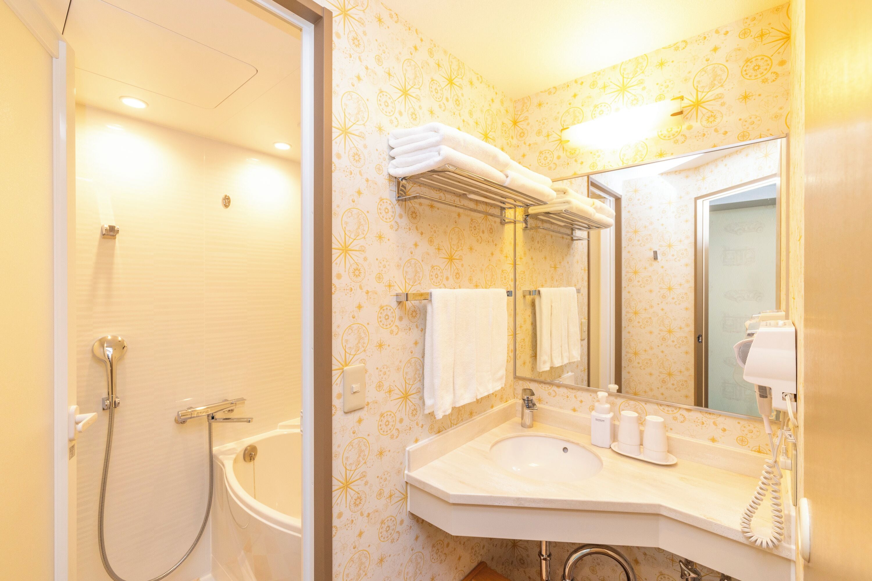 separate bathtub and shower, free toiletries, hair dryer, slippers