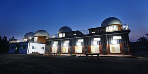 Front of property - evening/night - Jeju Starry Sky Pension (Seogwipo)