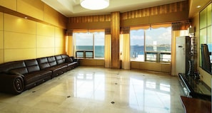 Condo (Royal Suite) | Living room | Flat-screen TV - Navis Hotel (Jeju City)