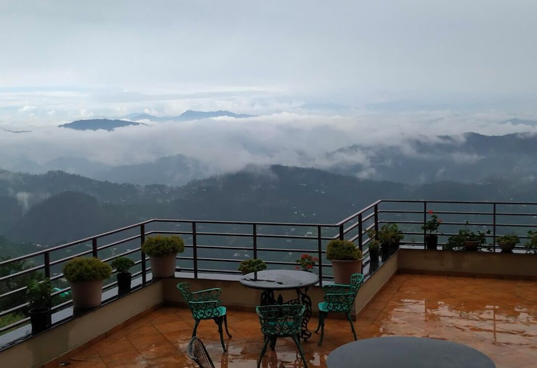 Breakfast, lunch, dinner served; international cuisine, garden views 