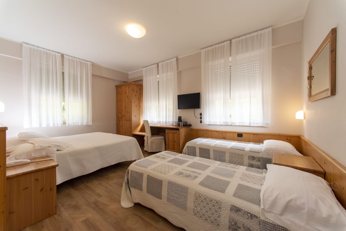 quadruple room | premium bedding, minibar, in-room safe, desk