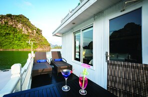 Suíte, terraço | Terraço/pátio