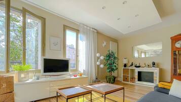 Premium appartement, en-suite badkamer, uitzicht op park | Woonruimte