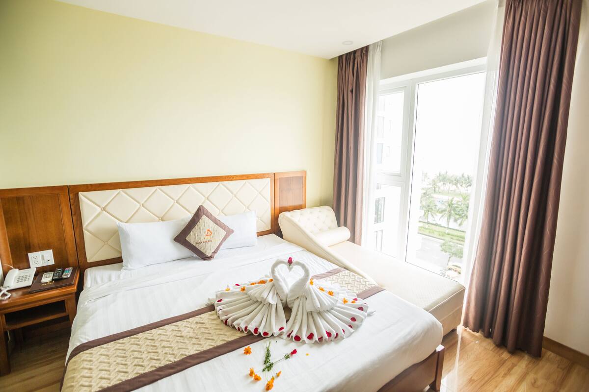 Deluxe Quadruple Room, 1 Bedroom, Non Smoking | Minibar (free items), in-room safe, desk, blackout drapes