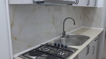 Réfrigérateur, plaque de cuisson, cafetiÚre/bouilloire