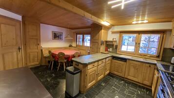 Superior Chalet | Private kitchen | Fridge, microwave, oven, stovetop