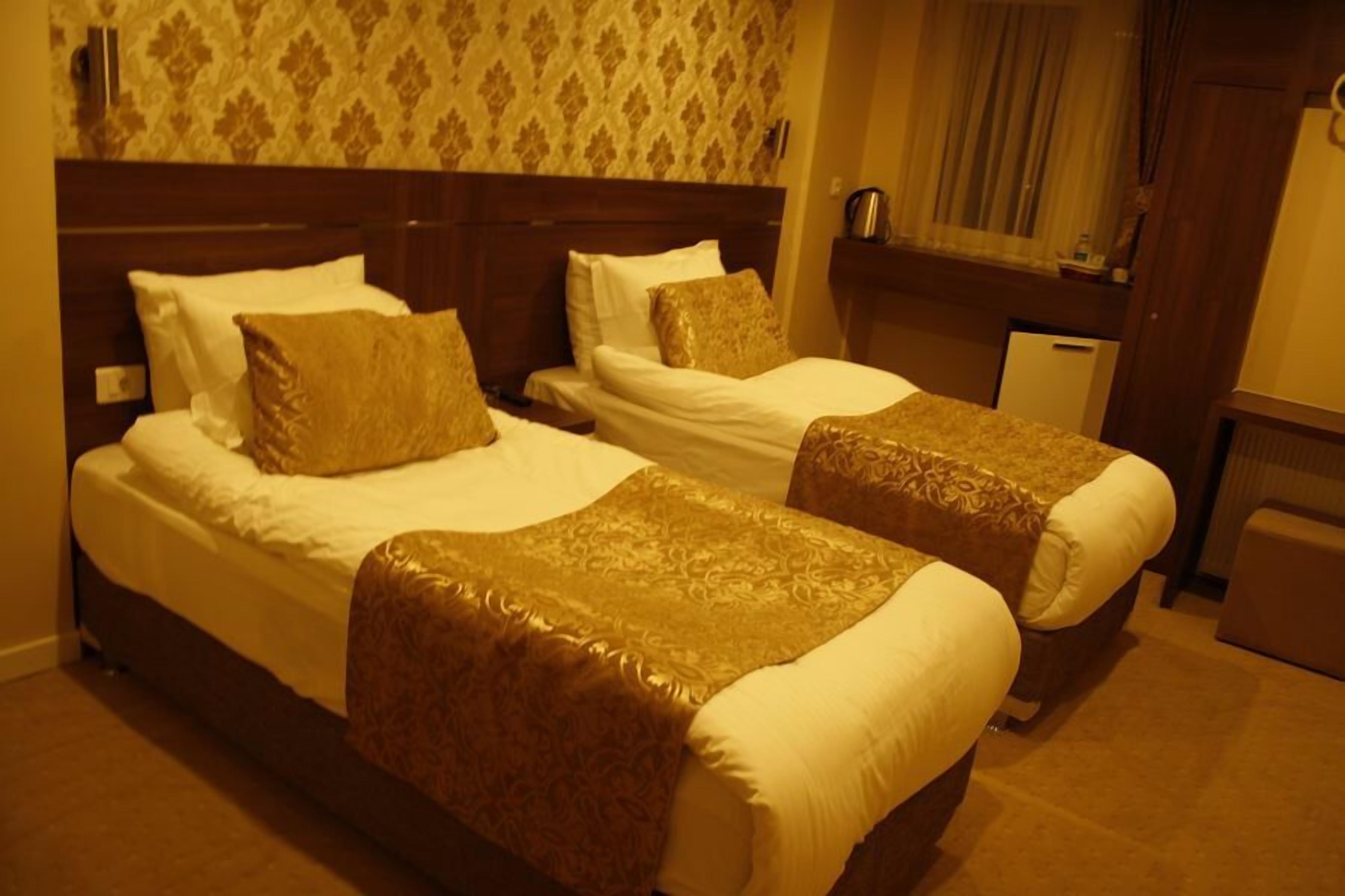 Kamar Double atau Twin Standar | Minibar, brankas, meja kerja, dan Wi-Fi gratis