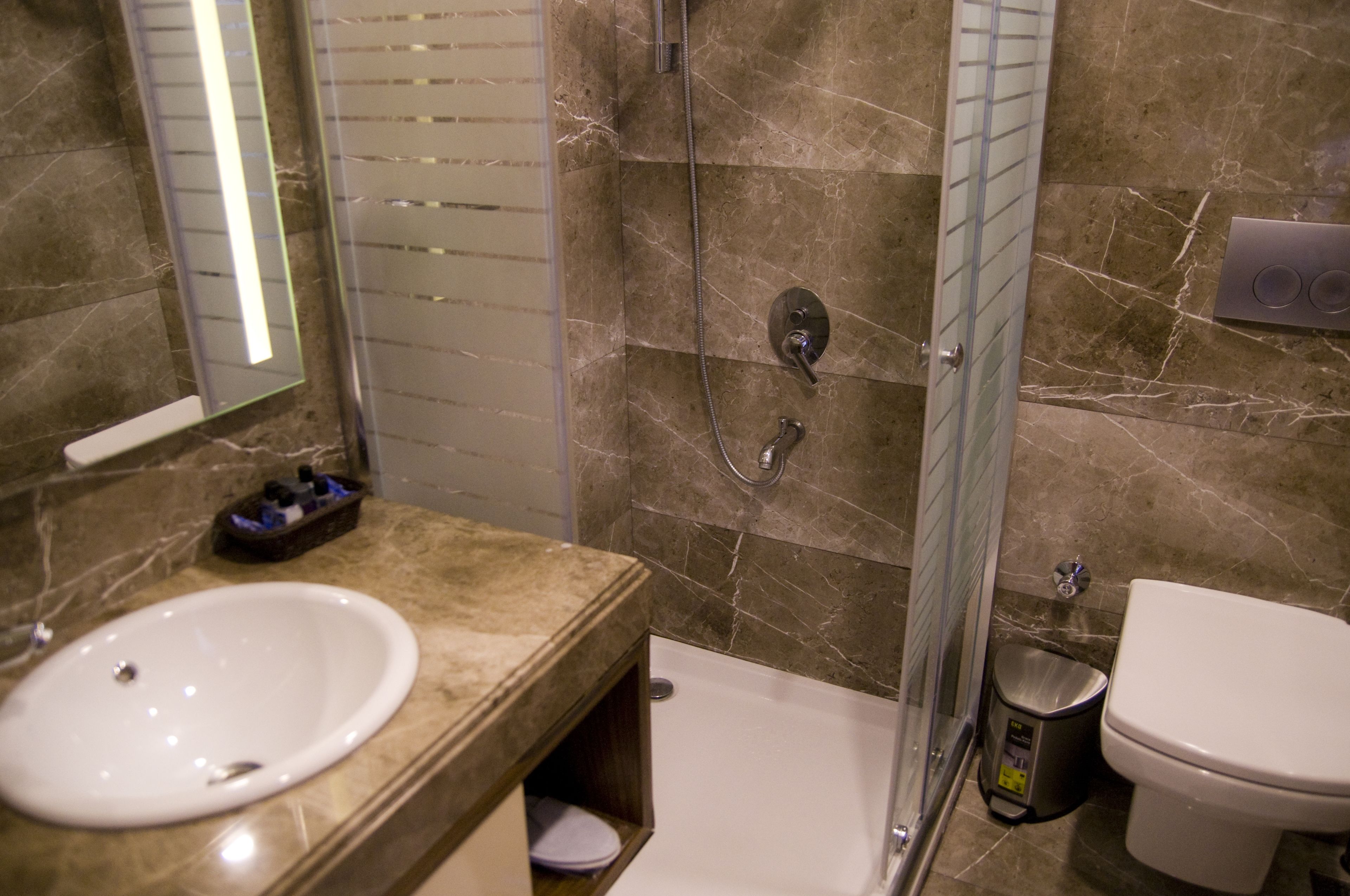 deluxe triple room | bathroom | shower, free toiletries, hair dryer, slippers