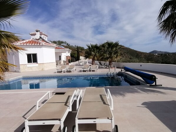 Outdoor pool, pool umbrellas, pool loungers