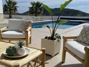 Outdoor pool, pool umbrellas, pool loungers