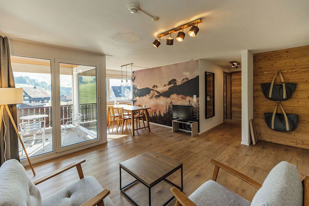 Suite (Roggenstock) | Living area | 50-inch flat-screen TV with cable channels, TV, foosball