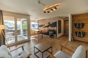 Suíte (Roggenstock) | Área de estar | TV de tela plana 50 polegadas com canais a cabo, TV, pebolim