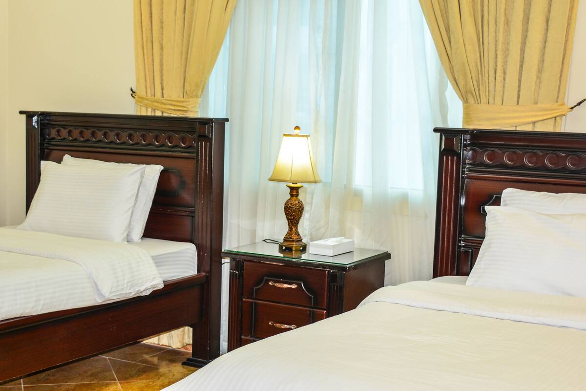 Apartment, 2 Bedrooms | 1 bedroom, iron/ironing board, free cots/infant beds, rollaway beds