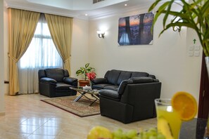 Family Apartment, 2 Bedrooms | Living area - Al Misrea Tower (Manama)
