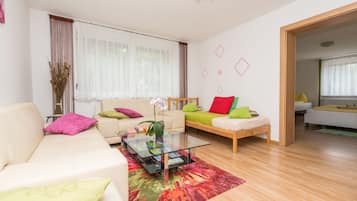 Apartment, 2 Bedrooms | Living area | Flat-screen TV