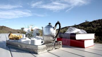 Breakfast, lunch, dinner served; local cuisine