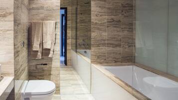 Deluxe Apartment, 2 Bedrooms | Bathroom | Separate tub and shower, hair dryer, towels, toilet paper