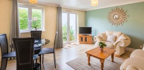 32-inch flat-screen TV with digital channels, TV, DVD player