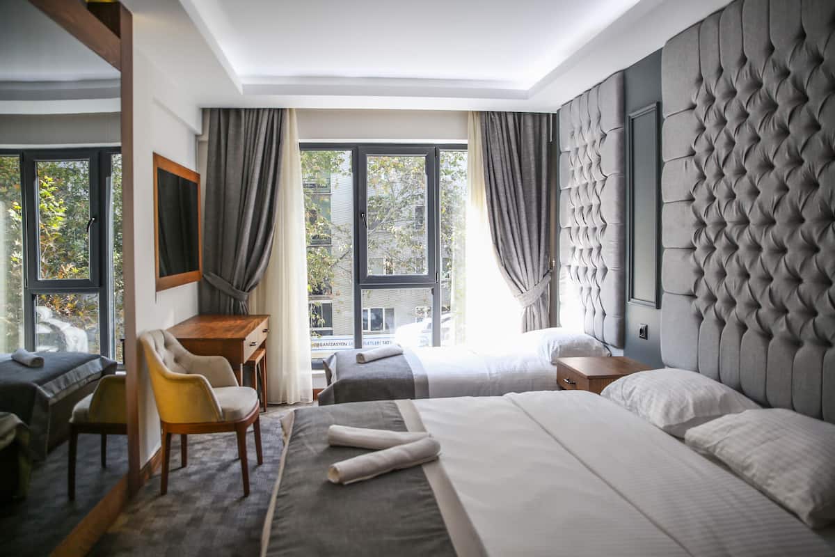 Family Triple Room, 1 Bedroom, Non Smoking, City View | Premium bedding, minibar, in-room safe, desk