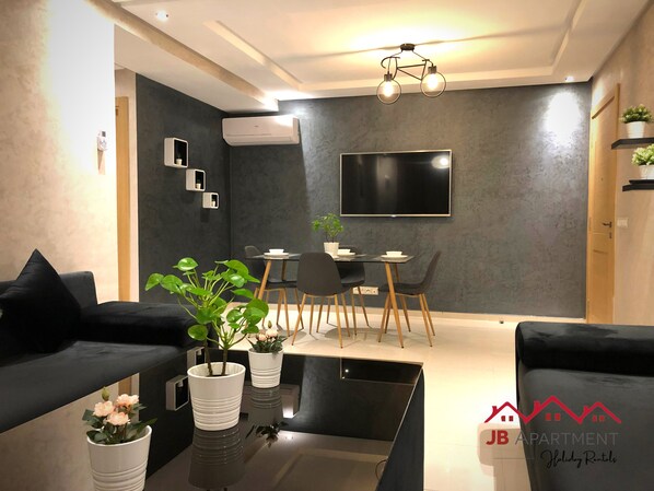 Comfort Apartment, 2 Bedrooms, Kitchen, City View | Living area | TV