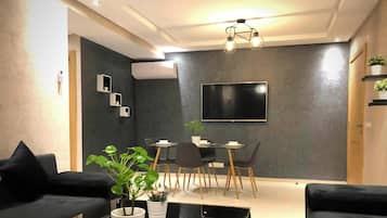 Comfort Apartment, 2 Bedrooms, Kitchen, City View | Living area | TV