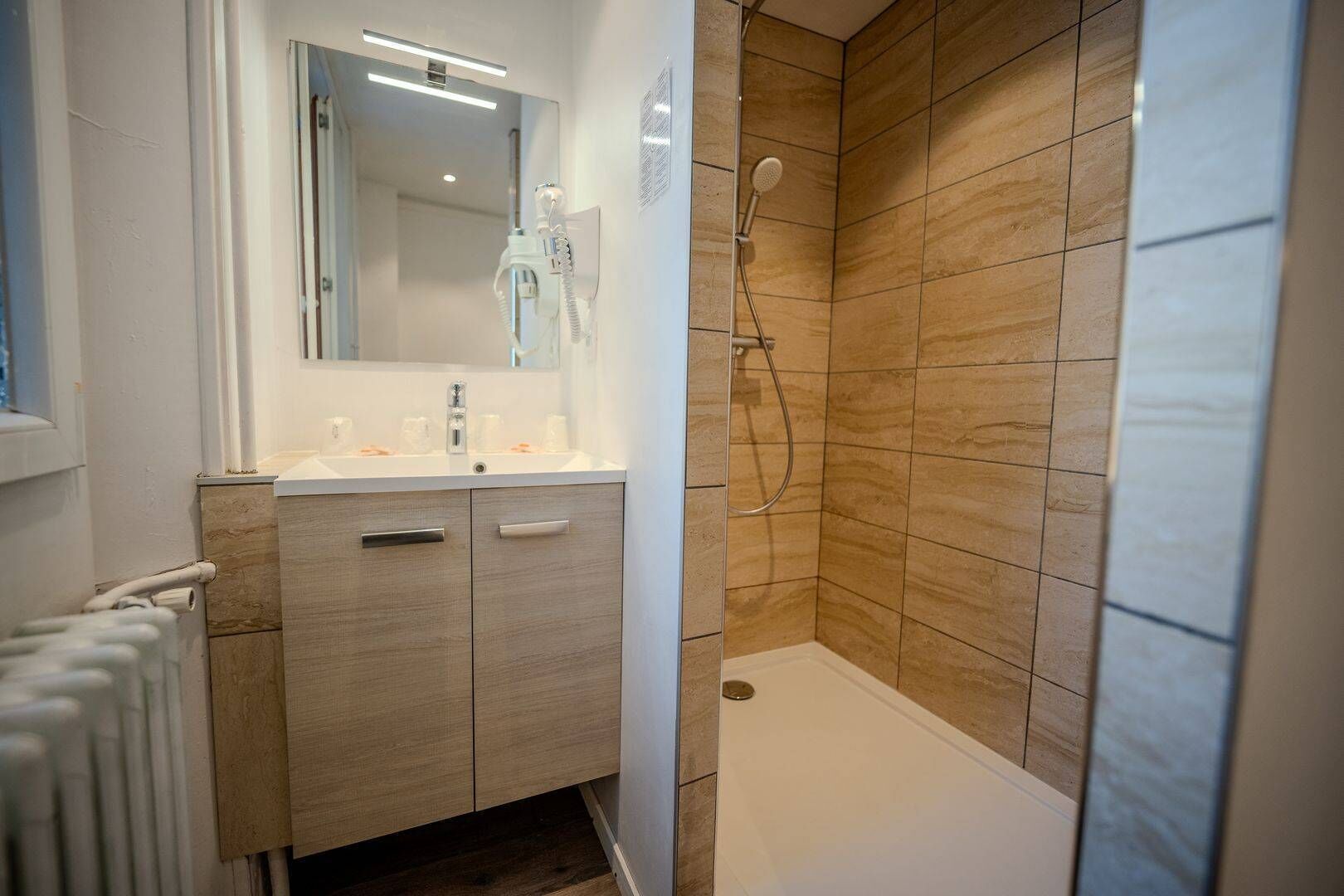 premium quadruple room | bathroom | shower, free toiletries, hair dryer, towels
